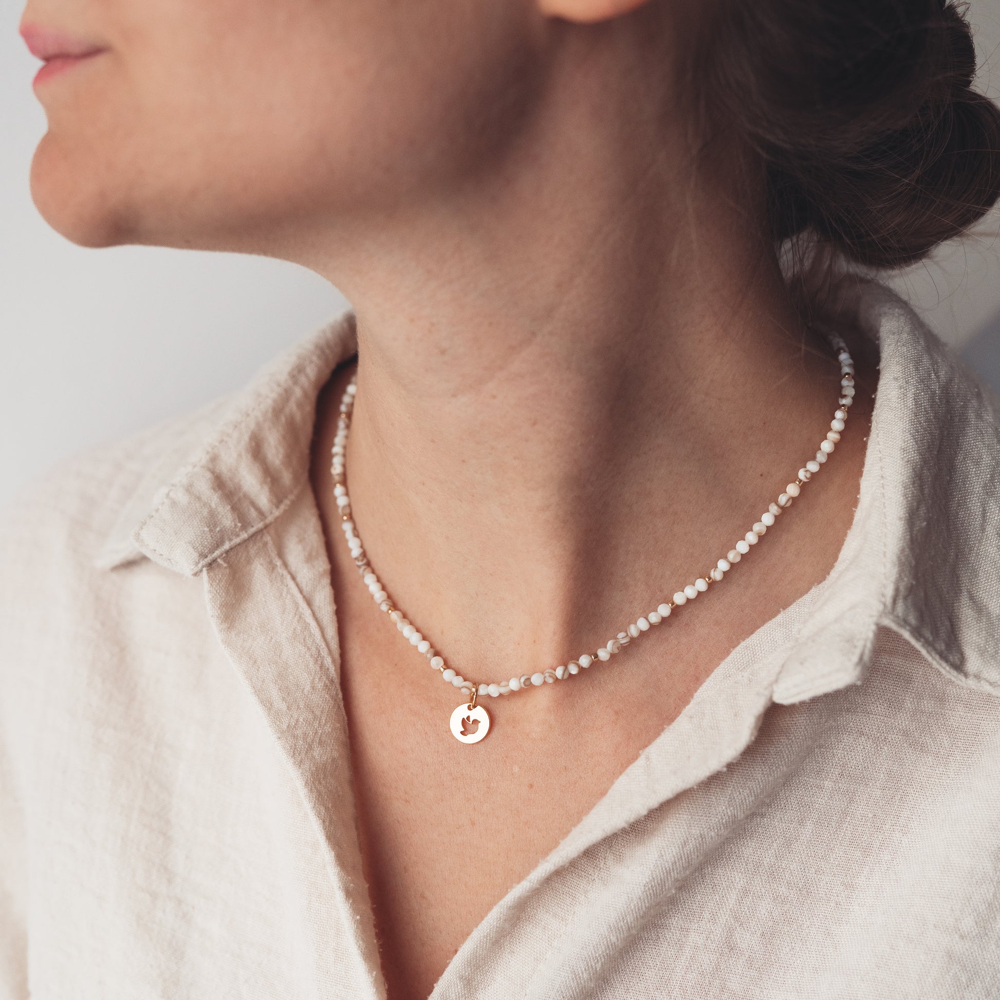 Naszyjnik Muszelki wybraną pozłacaną zawieszką